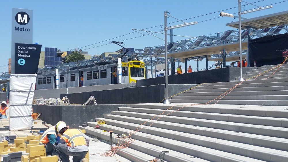 The first train pulls into the Expo Line Downtown Santa Monica station during clearance testing.