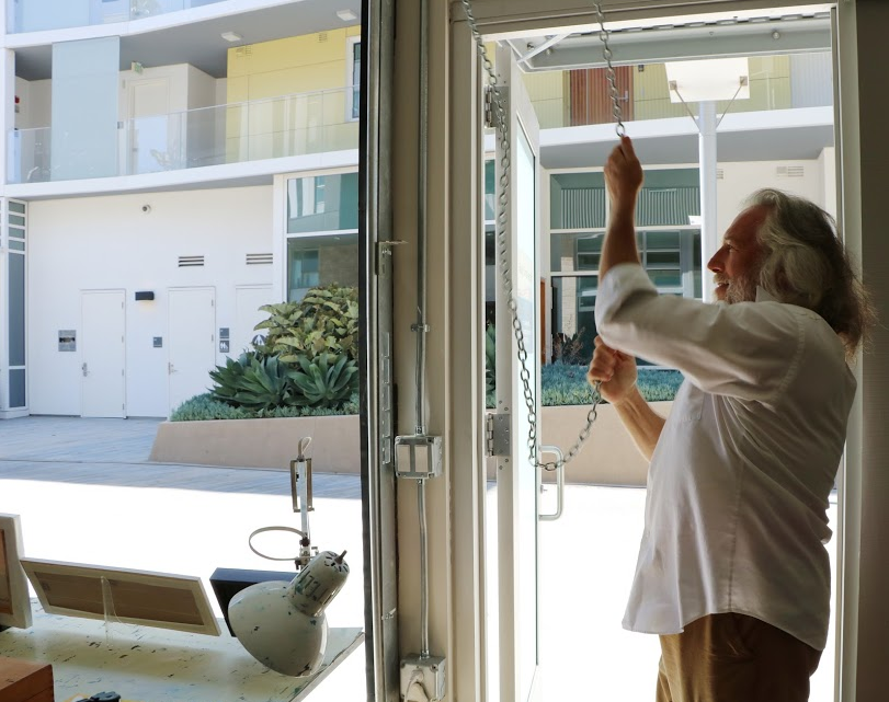 Baroff opens the front of his live/work space to the street for passersby to see his work.