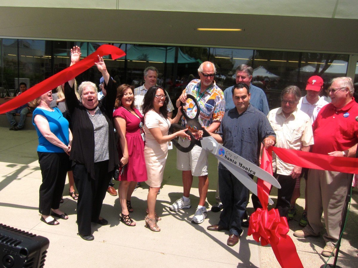 Santa Monica Mayor Pam O'Connor and City Councilmember Bob Holbrook, Terry O'Day, and Kevin McKeown join other City officials to cut the ribbon during the grand opening ceremony of the Pico Branch library at Virginia Avenue Park on Saturday, June 28. (Photos by Saul Rubin)