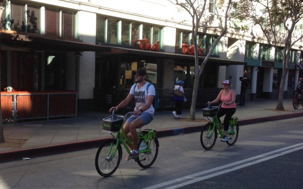 Bicyclists riding Breeze in downtown Santa Monica.