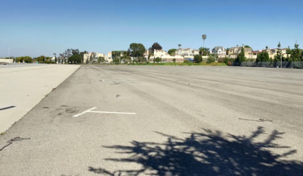 A photo showing an empty six-acre plane parking lot at the southeast corner of Santa Monica Airport (photo by Michael Brodsky via Airport2Park)